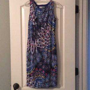 Beautiful multicolored dress with gold garnishes